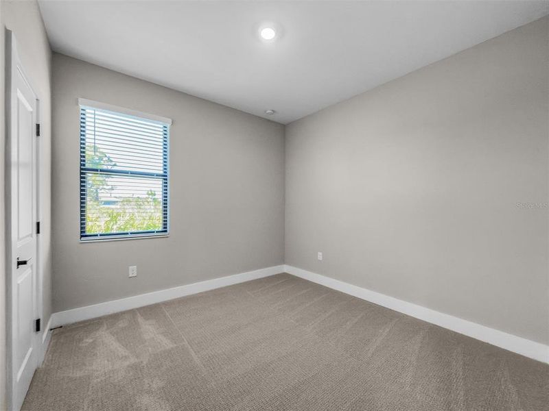 Spacious, unfurnished interior of a new home in , Port Charlotte (Image 18).