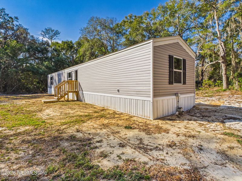 Exterior details and patio area of a home in , Hawthorne (Image 16).