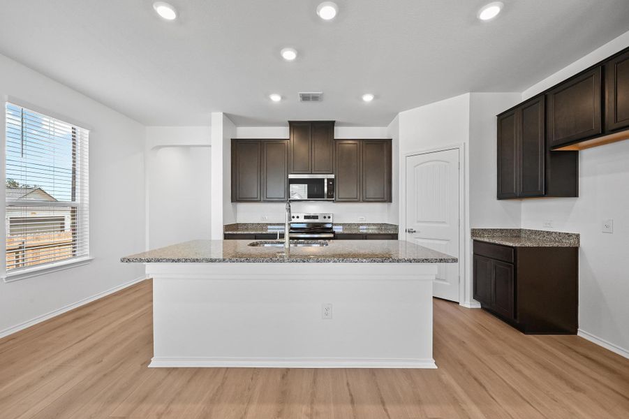 Furnished interior view inside a new home in Creekside at Estancia, Austin (Image 8).