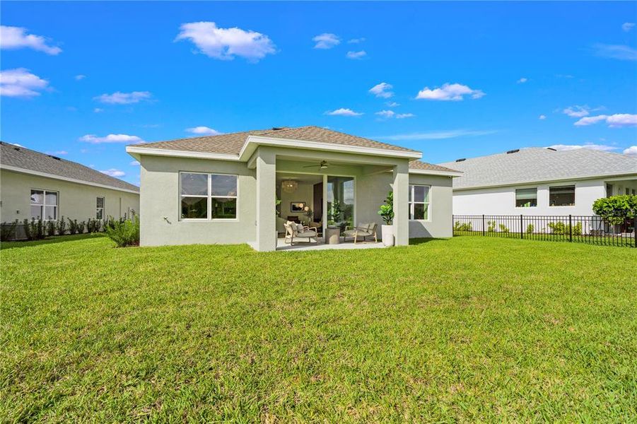 Exterior details and patio area of a home in North River Ranch -  Longmeadow, Parrish (Image 21).