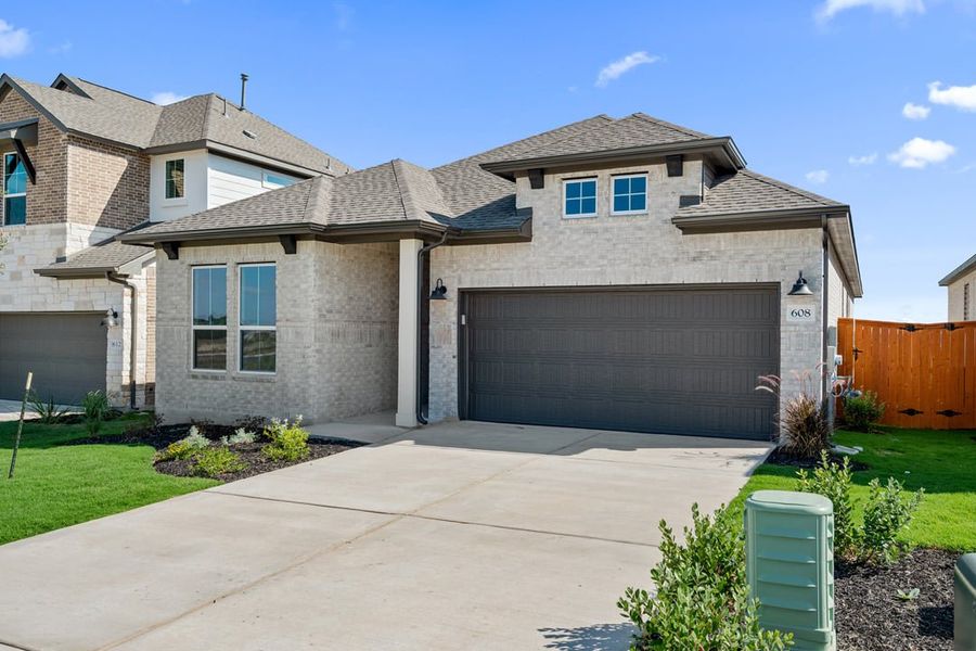 Exterior details and patio area of a home in Arbor Collection at Lariat, Liberty Hill (Image 2). Exterior details and patio area of a home in Arbor Collection at Lariat, Liberty Hill (Image 2).