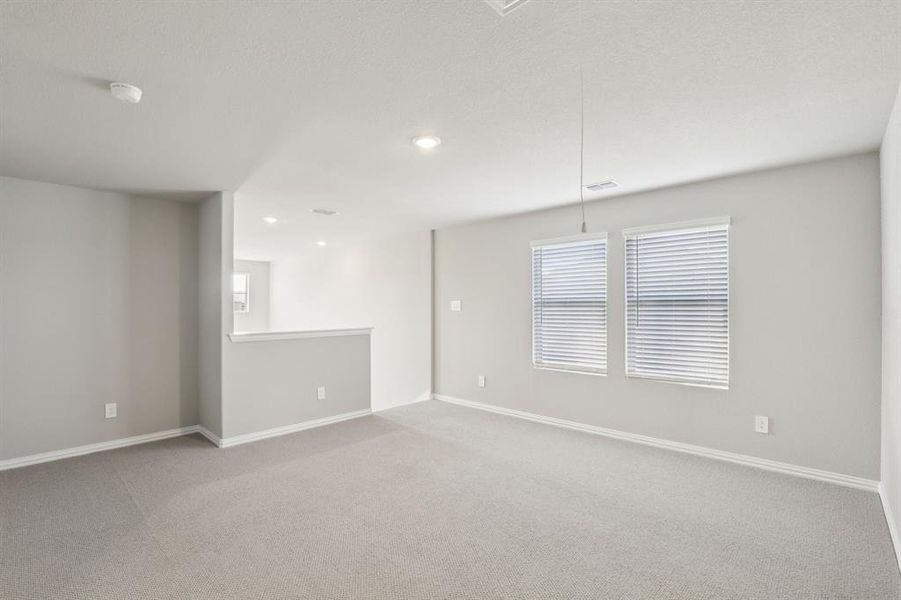 Spacious, unfurnished interior of a new home in Simpson Crossing - Spring Series, McKinney (Image 22).