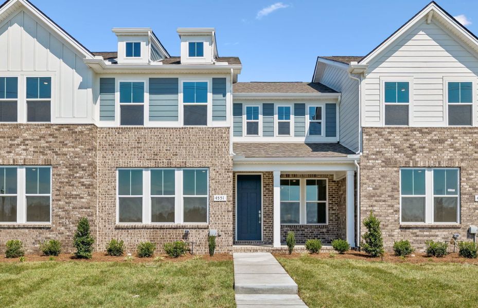Front exterior of a new home in Bradshaw Farms Reserve, Mount Juliet, TN, highlighting curb appeal (Image 1). Front exterior of a new home in Bradshaw Farms Reserve, Mount Juliet, TN, highlighting curb appeal (Image 1).