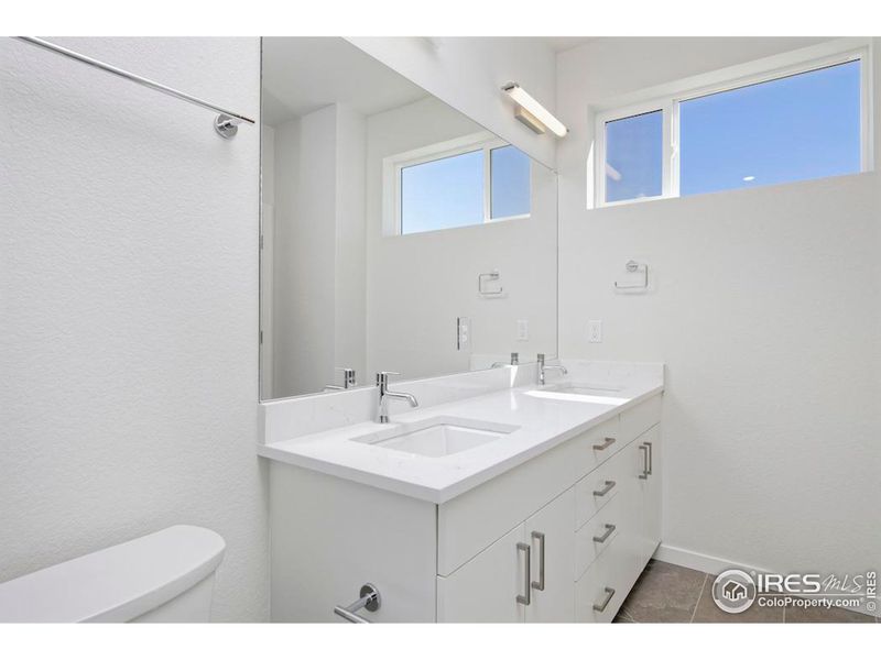 Primary Bathroom with double vanities