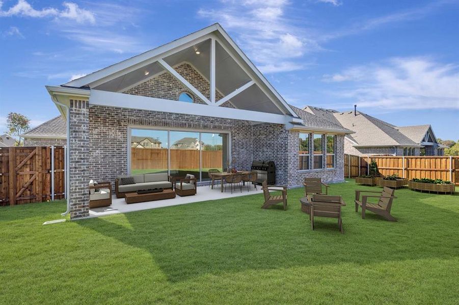 Exterior details and patio area of a home in Kreymer at the Park, Wylie (Image 26).