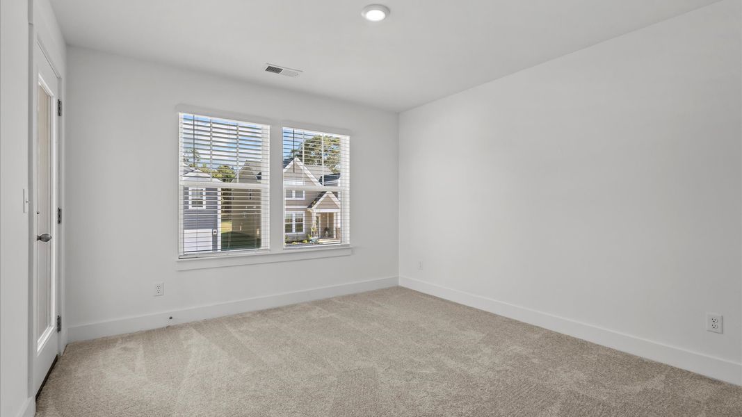 Representative furnished interior of a home built from the Freesia by DRB Homes in Spring Branch, Smyrna (Image 31).
