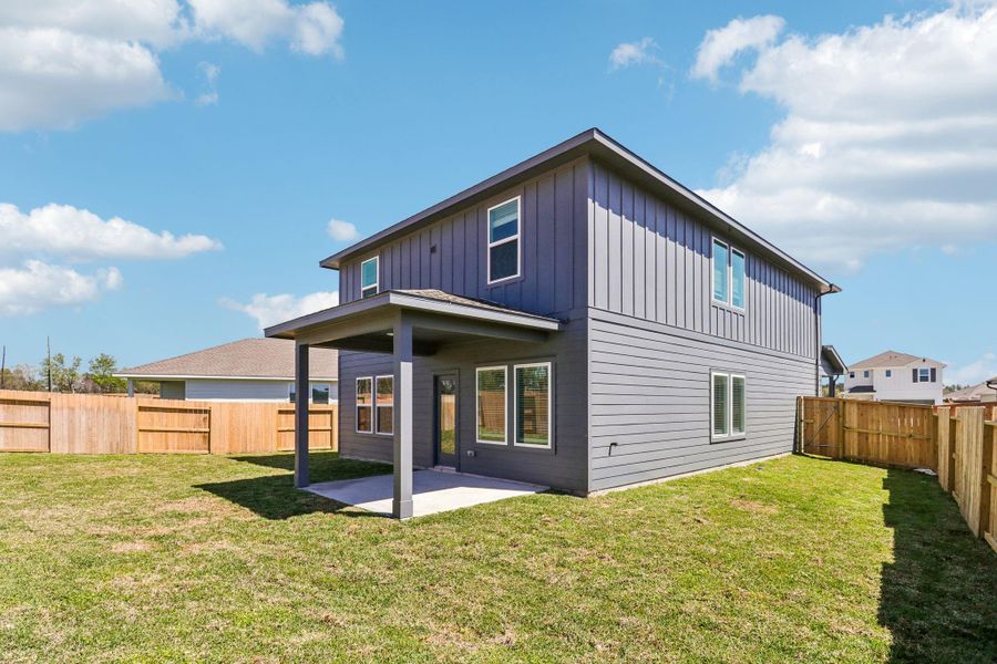 Exterior details and patio area of a home in Granger Pointe - Traditional Series, Conroe (Image 21).