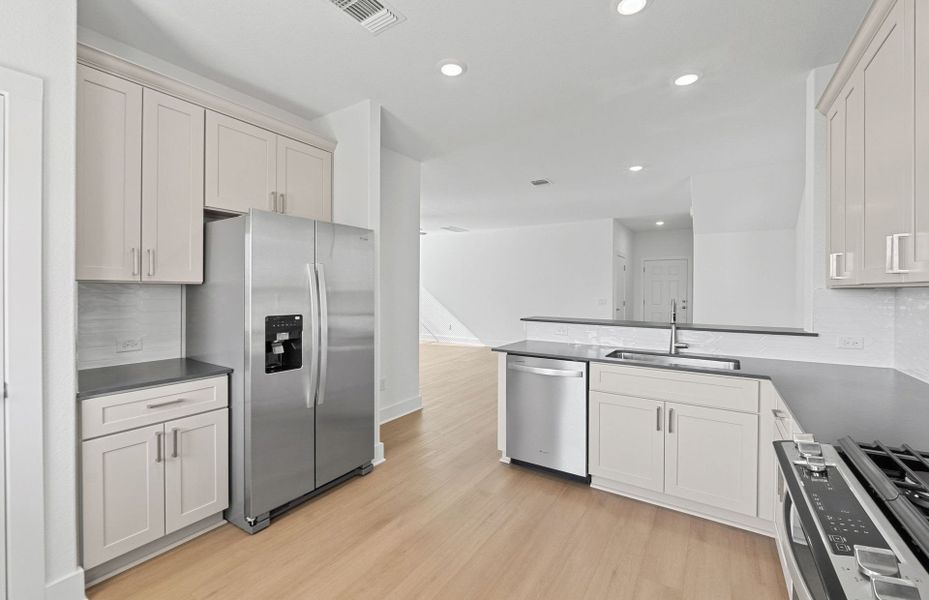Furnished interior view inside a new home in Crosswinds, Kyle (Image 8).