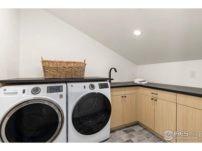 Electrolux side by side front load washer & dryer.