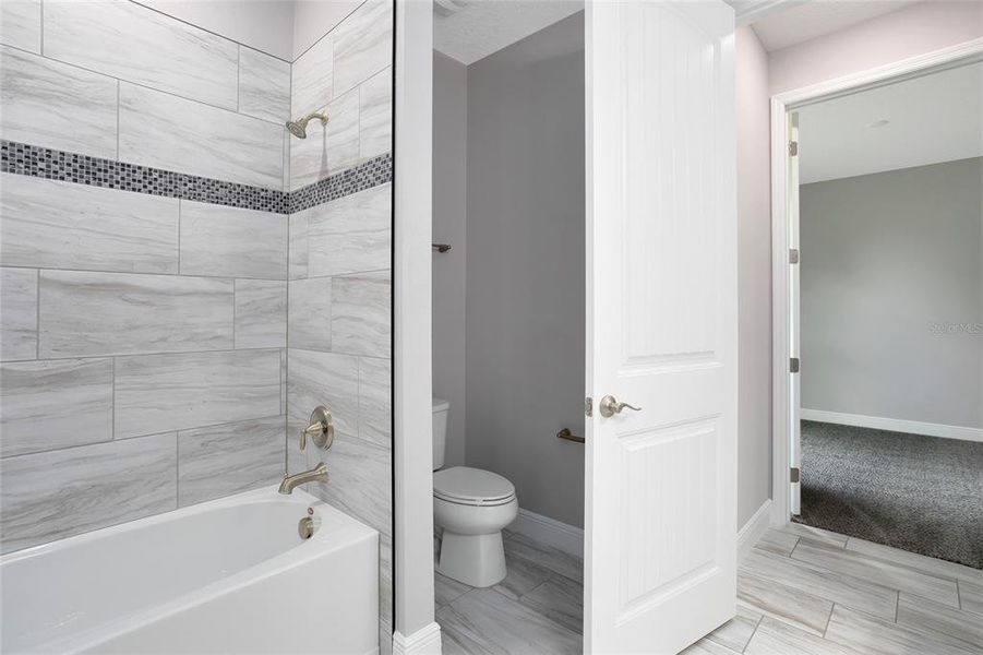 UPGRADED BATHROOM FINISHES.