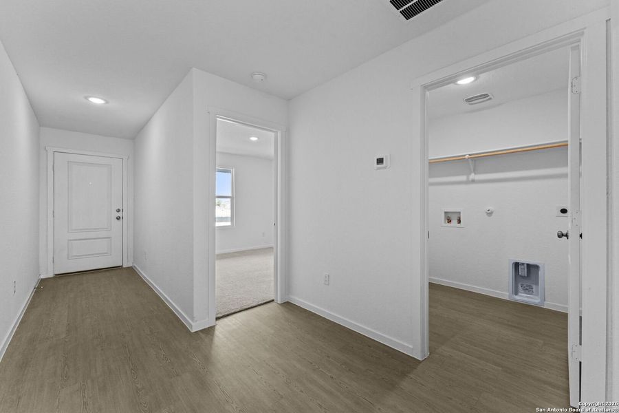 Spacious, unfurnished interior of a new home in Voss Farms: Watermill Collection, New Braunfels (Image 18).