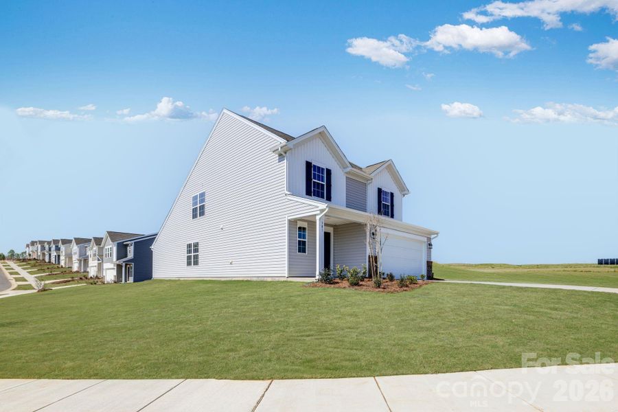 Front exterior of a new home in Cleveland Hill, Shelby, NC, highlighting curb appeal (Image 17). Front exterior of a new home in Cleveland Hill, Shelby, NC, highlighting curb appeal (Image 17).
