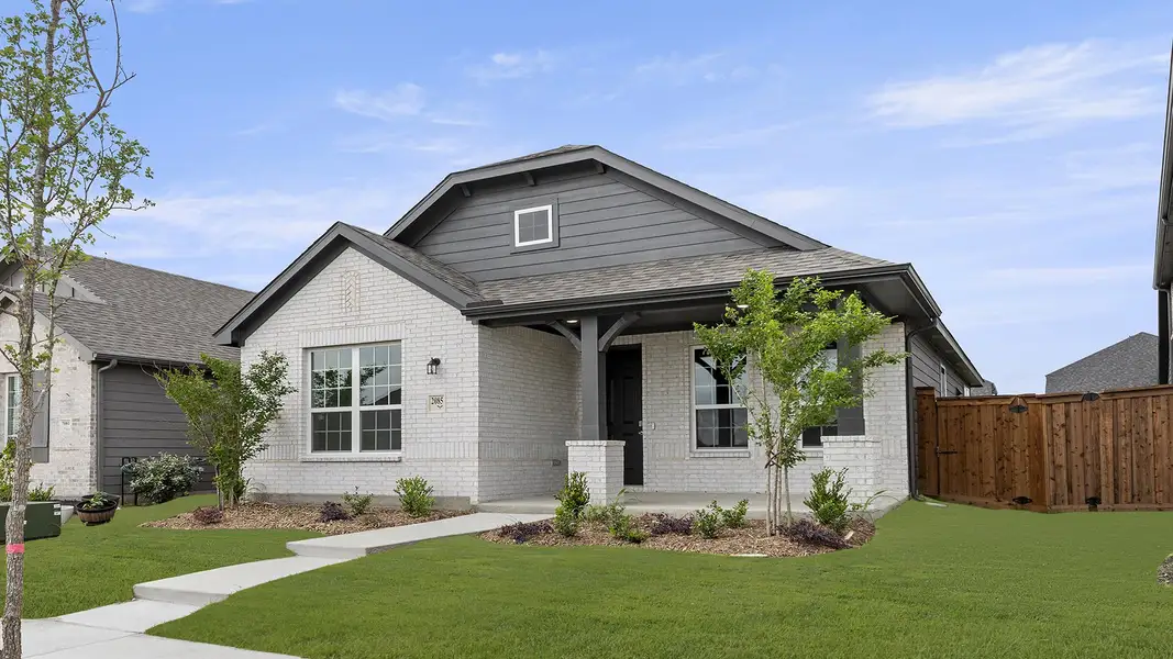 Front exterior of a new home in Waterscape, Royse City, TX, highlighting curb appeal (Image 21).
