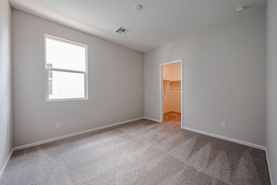 A room with a door and a window.