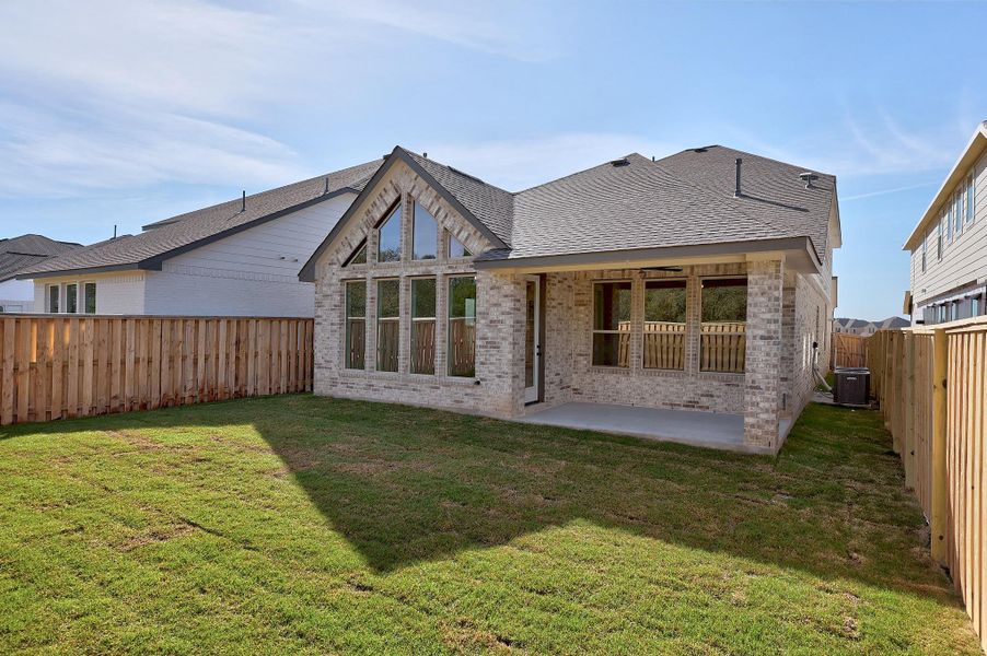 Exterior details and patio area of a home in Parmer Ranch, Georgetown (Image 4).