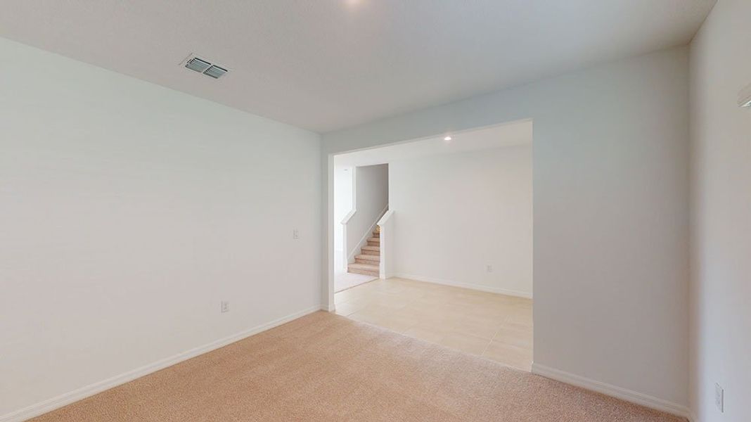 Representative unfurnished interior of a home built from the Azalea by Taylor Morrison in Riverfront, Edgewater (Image 11).