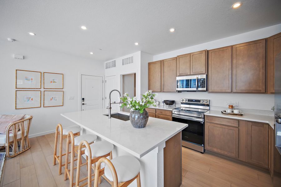 Furnished interior view inside a new home in Lyric at RidgeGate Condos, Lone Tree (Image 8).