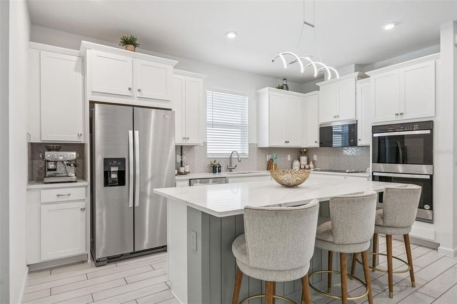 Furnished interior view inside a new home in Waterbrooke, Clermont (Image 16).