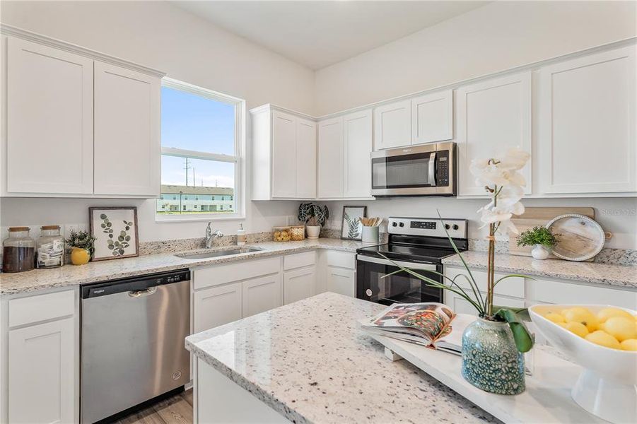 Furnished interior view inside a new home in Sol Vista, Dundee (Image 12).
