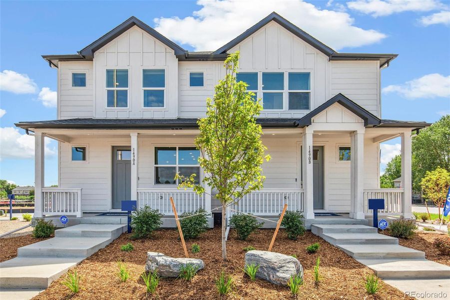 Front exterior of a new home in Arcadia, Denver, CO, highlighting curb appeal (Image 2). Front exterior of a new home in Arcadia, Denver, CO, highlighting curb appeal (Image 2).