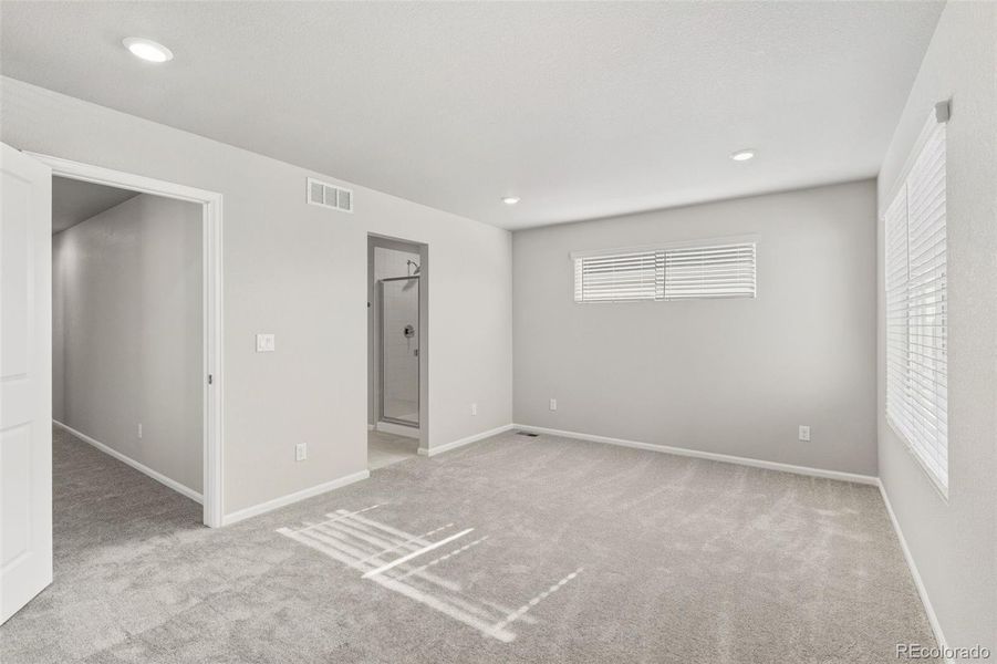 Spacious, unfurnished interior of a new home in Woodrose at Painted Prairie, Aurora (Image 22).