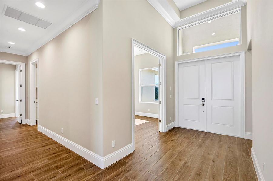 14322 SW Belterra Dr_Foyer to Den