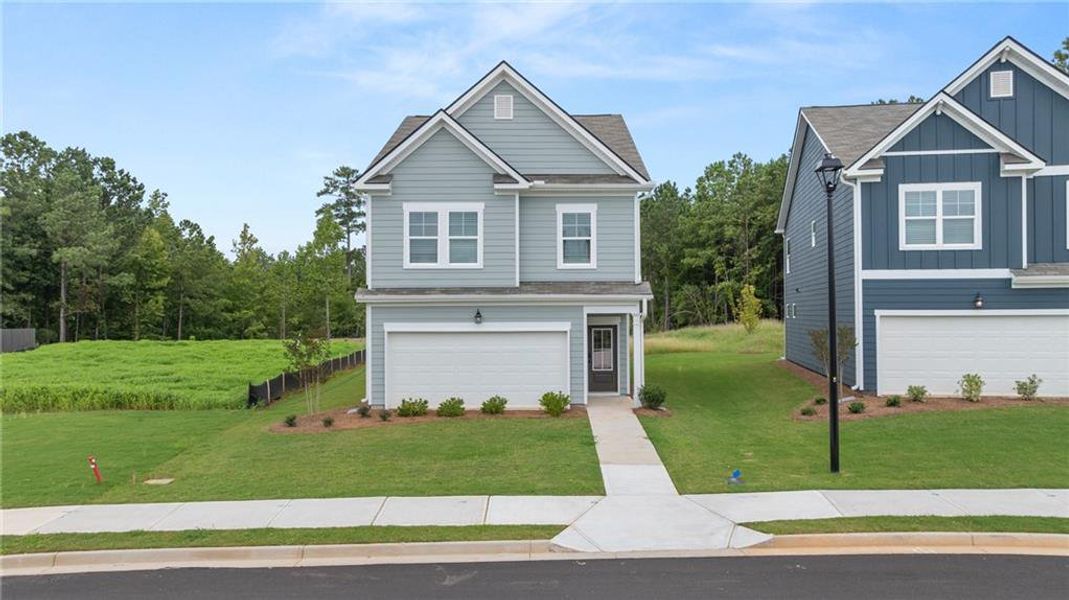 Front exterior of a new home in Walden Park - The Retreat, Jonesboro, GA, highlighting curb appeal (Image 26).