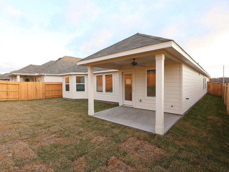Exterior details and patio area of a home in Lone Star Landing, Montgomery (Image 3).