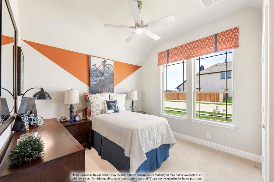 Bedroom with vaulted ceiling, ceiling fan, orange accent wall design, and double windows with orange valance