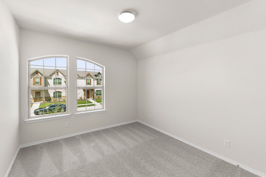 Front exterior of a new home in Sanger Circle, Sanger, TX, highlighting curb appeal (Image 7). Front exterior of a new home in Sanger Circle, Sanger, TX, highlighting curb appeal (Image 7).