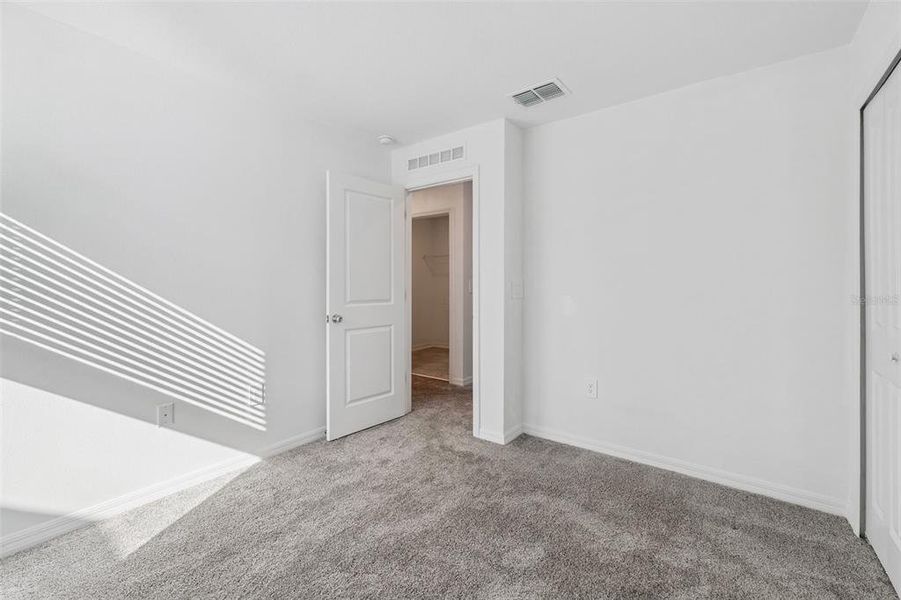 Spacious, unfurnished interior of a new home in Peace Creek Reserve: Legacy Collection, Winter Haven (Image 14). Spacious, unfurnished interior of a new home in Peace Creek Reserve: Legacy Collection, Winter Haven (Image 14).