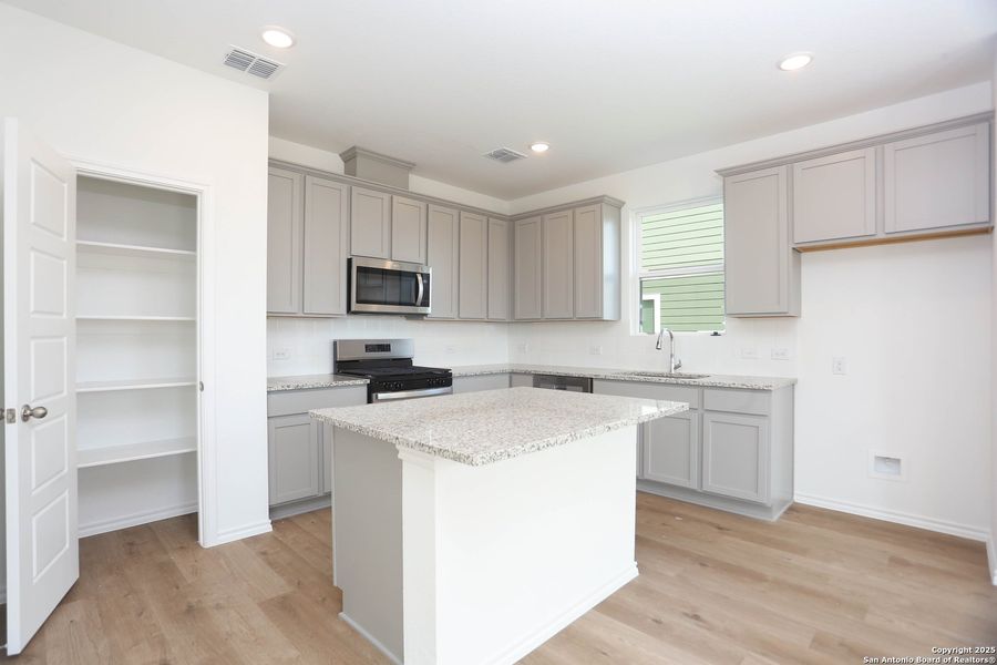 Furnished interior view inside a new home in Fairway Crossing 40s, San Antonio (Image 7).