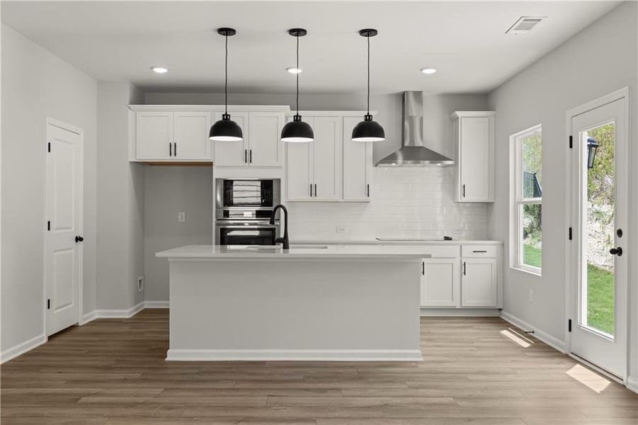 Furnished interior view inside a new home in The Bluffs, Canton (Image 8).