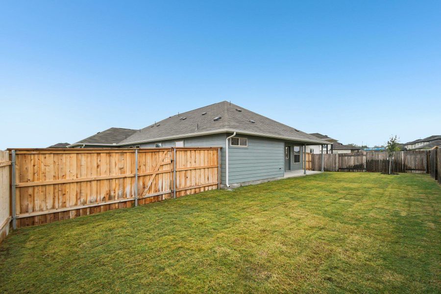 Exterior details and patio area of a home in Crosswinds, Kyle (Image 19).