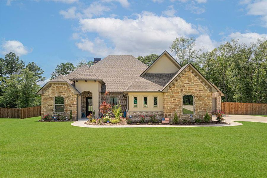 Front exterior of a new home in , Longview, TX, highlighting curb appeal (Image 19). Front exterior of a new home in , Longview, TX, highlighting curb appeal (Image 19).