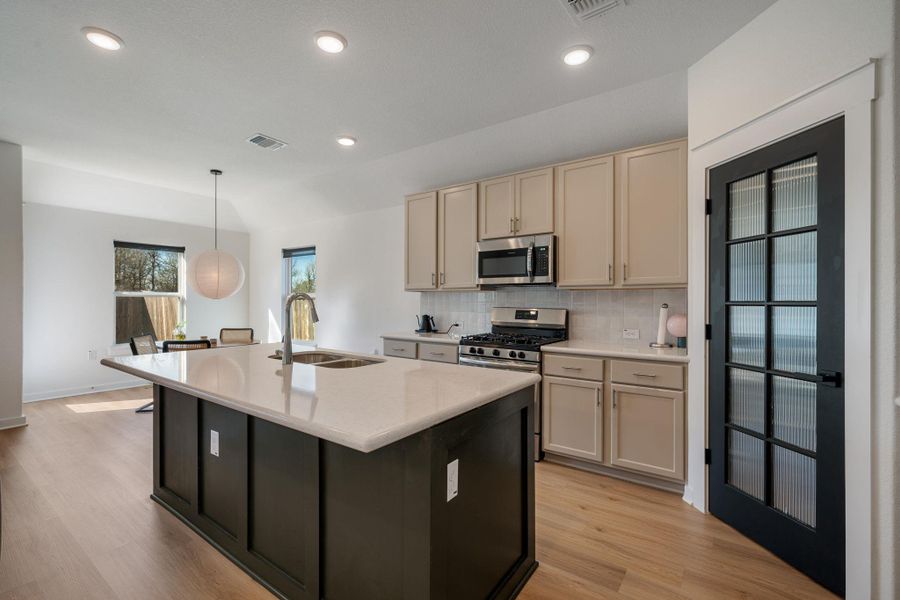 Furnished interior view inside a new home in Sun Chase, Del Valle (Image 8). Furnished interior view inside a new home in Sun Chase, Del Valle (Image 8).