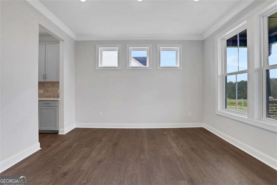 Spacious, unfurnished interior of a new home in The Paddocks at Doc Hughes, Buford (Image 37).