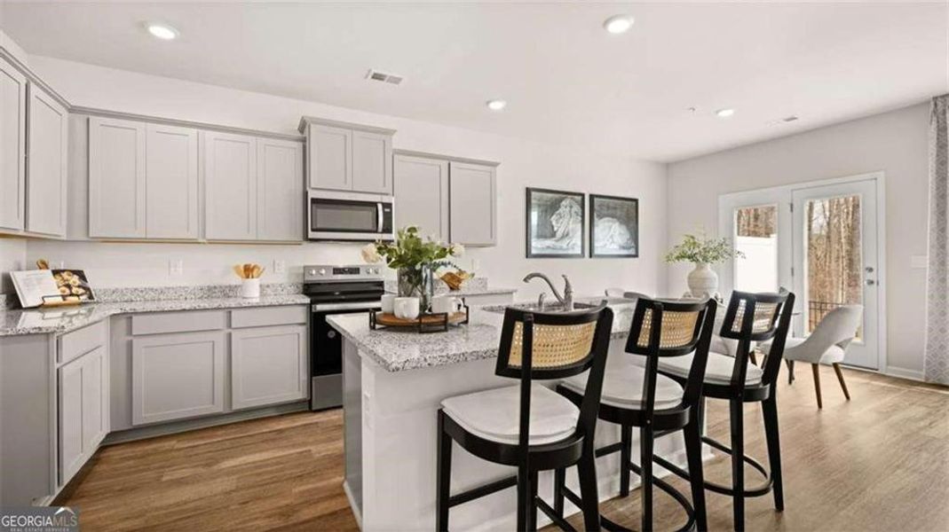 Furnished interior view inside a new home in Echo Glen, Stockbridge (Image 8).