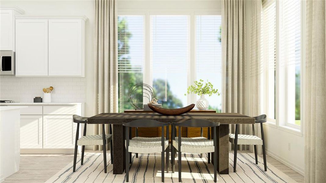 Dining area featuring light hardwood / wood-style flooring