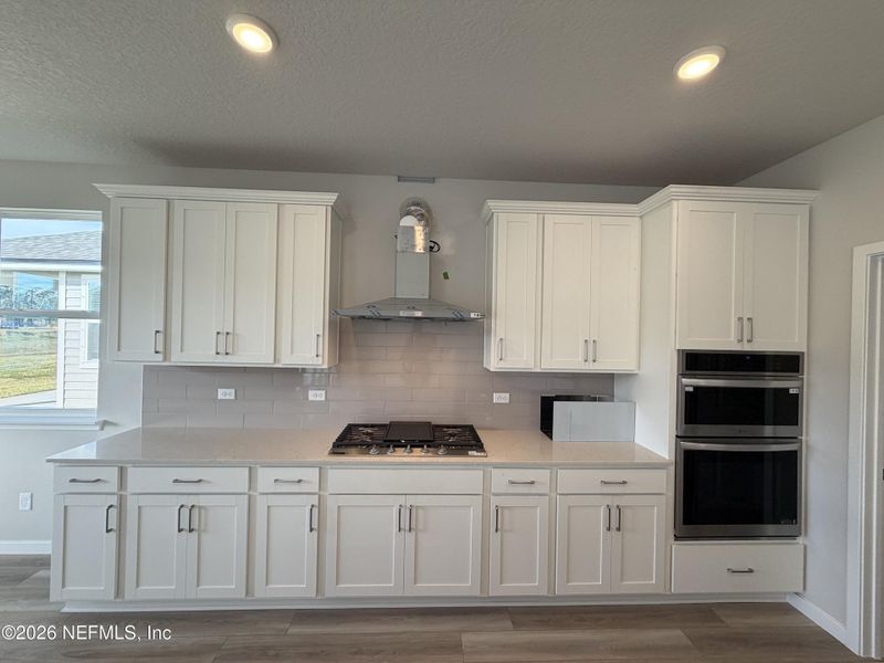 Furnished interior view inside a new home in The Cypress Series at Reserve East, Flagler Beach (Image 5).