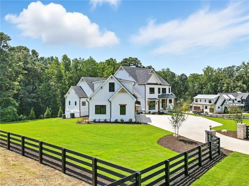 Front exterior of a new home in , Canton, GA, highlighting curb appeal (Image 29).