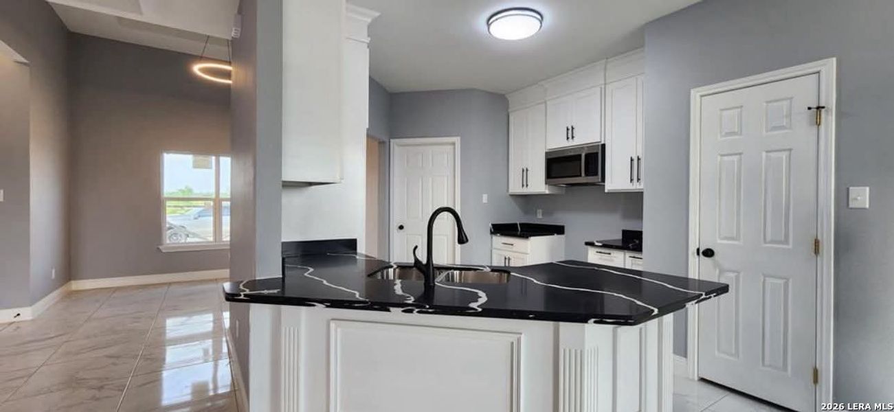 Furnished interior view inside a new home in , Eagle Pass (Image 6).