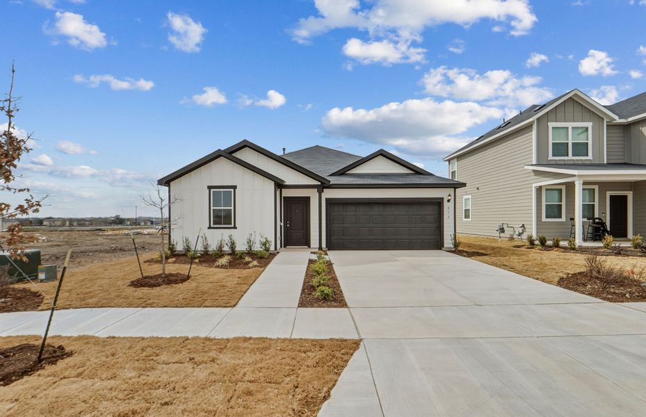 Front exterior of a new home in Alto, San Marcos, TX, highlighting curb appeal (Image 17).