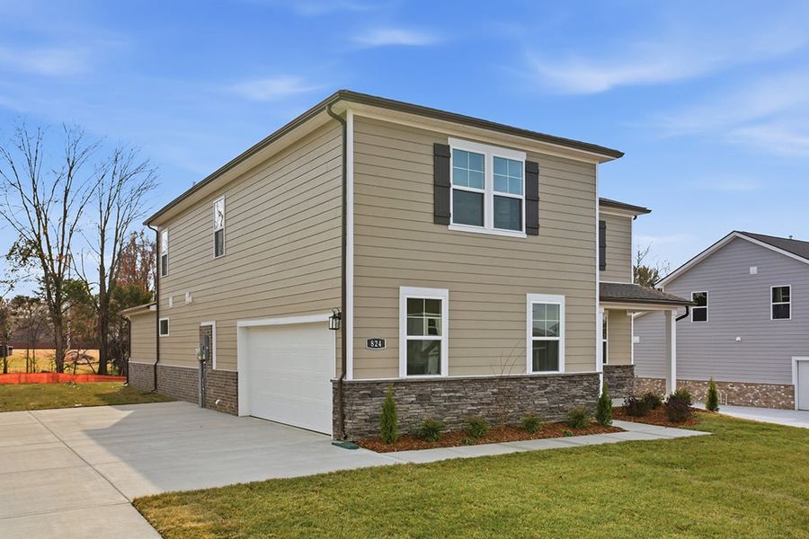 A house with a garage. A house with a garage.