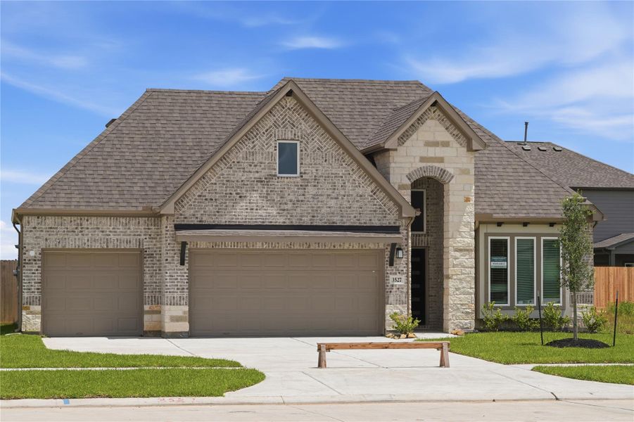 Front exterior of a new home in Foxtail Palms, Manvel, TX, highlighting curb appeal (Image 20).
