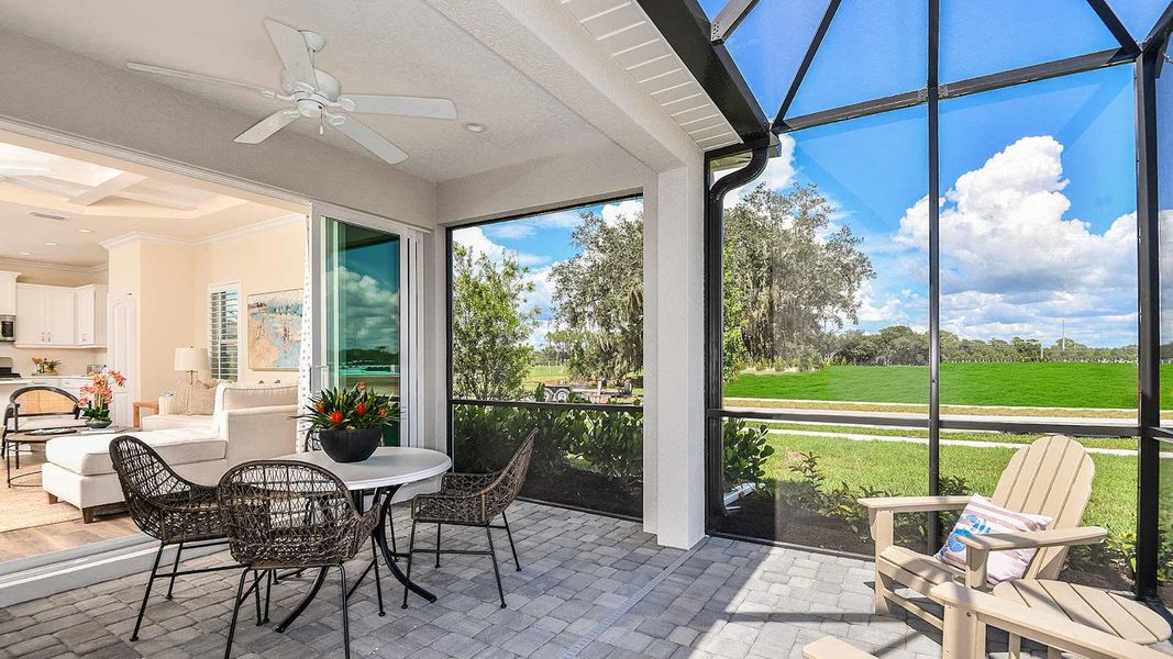 Exterior details and patio area of a home in Windward Real Estate and Homes for Sale in Sarasota, FL - Neal Communities, Sarasota (Image 4). Exterior details and patio area of a home in Windward Real Estate and Homes for Sale in Sarasota, FL - Neal Communities, Sarasota (Image 4).