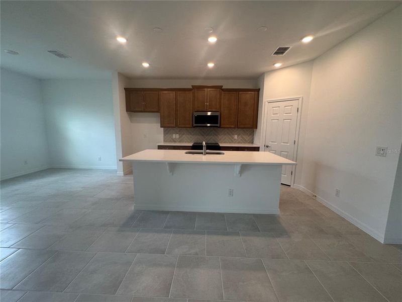 Furnished interior view inside a new home in Trinity Gardens, Deland (Image 6).