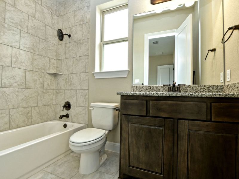 Representative furnished interior of a home built from the Siena II by Giddens Homes in Clearwater Ranch, Liberty Hill (Image 97).