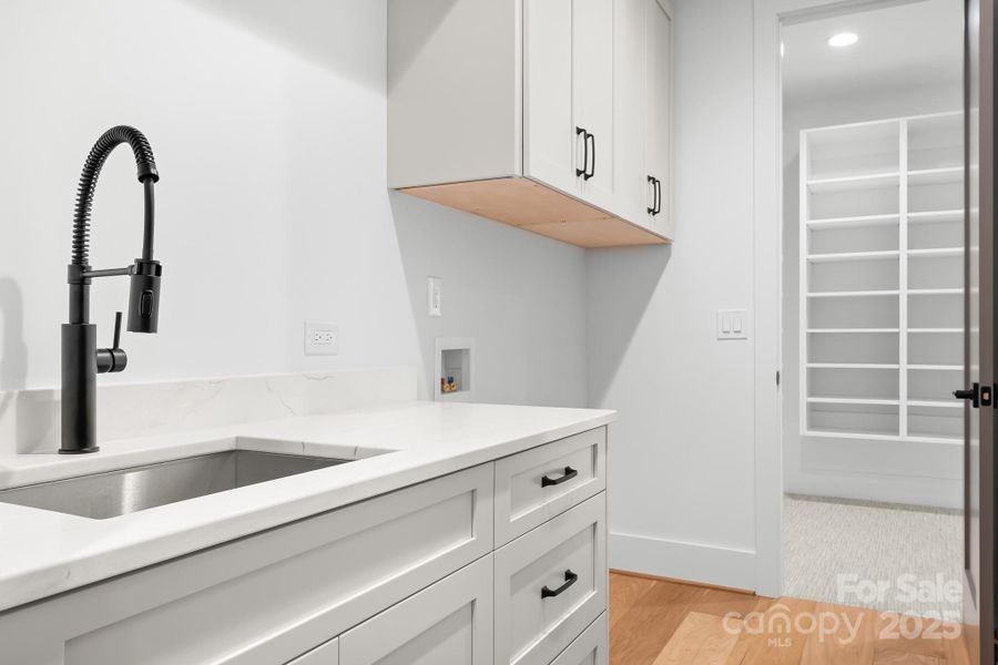 Laundy room has direct access to Primary closet and hallway