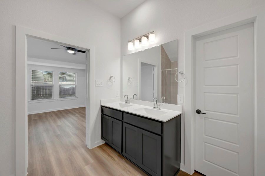 Furnished interior view inside a new home in Lone Star Landing, Montgomery (Image 8).